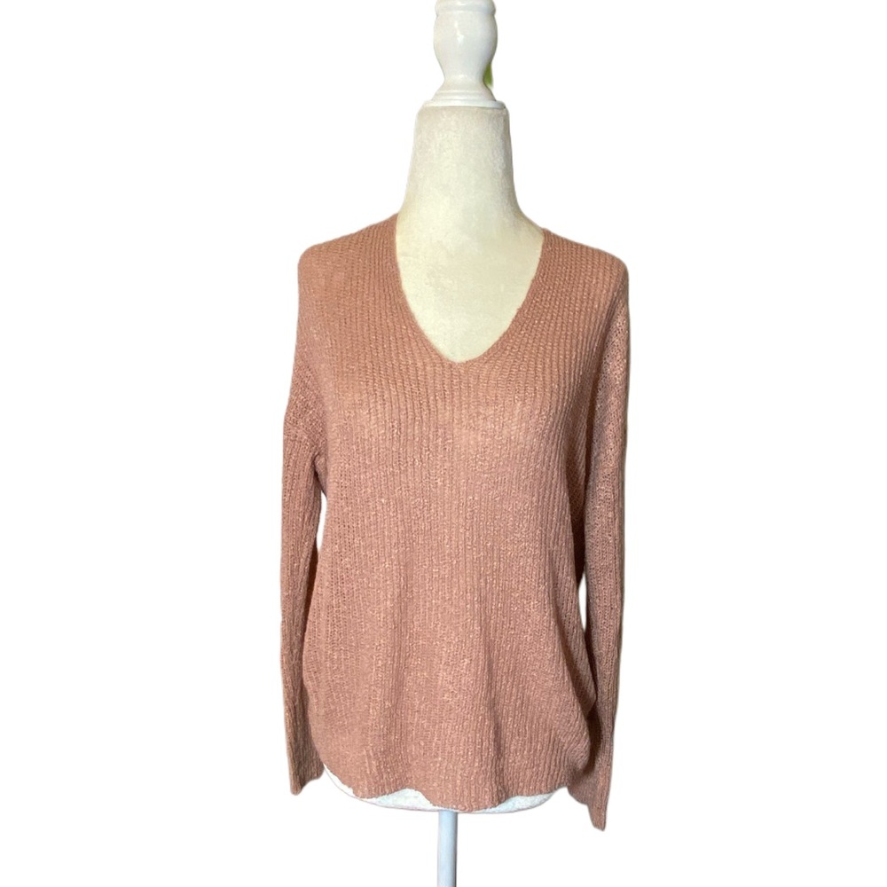 Creamy pink V neck knit loose fit sweater with twisted open back. Size small NWT